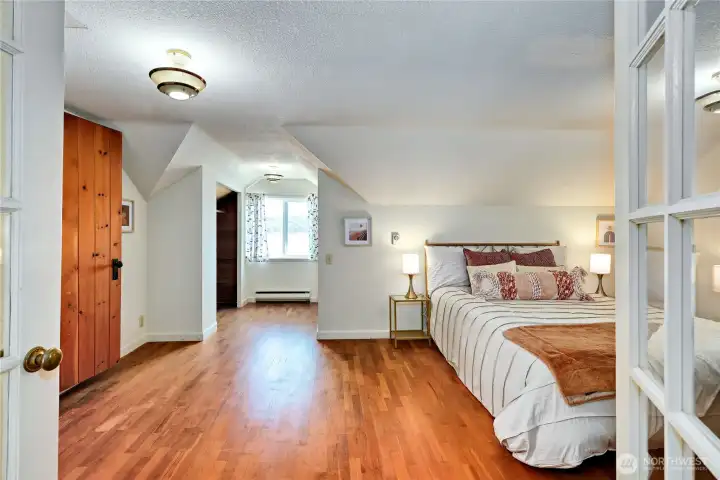 French doors that lead to the primary bedroom on 2nd level.  Very spacious room.