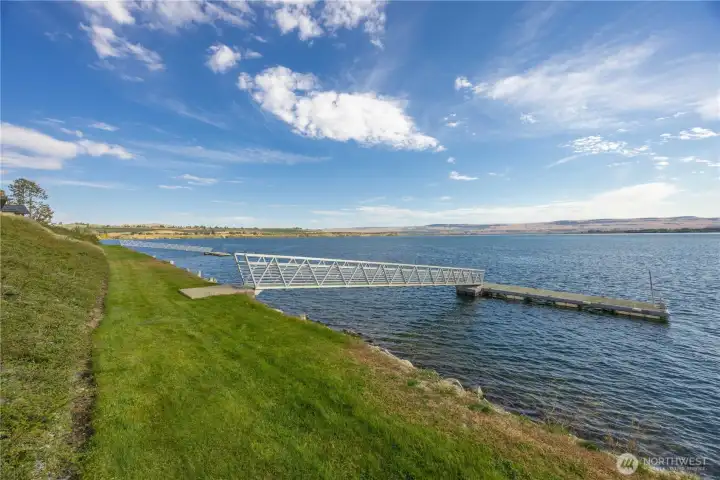 2 community docks & grassy shoreline area