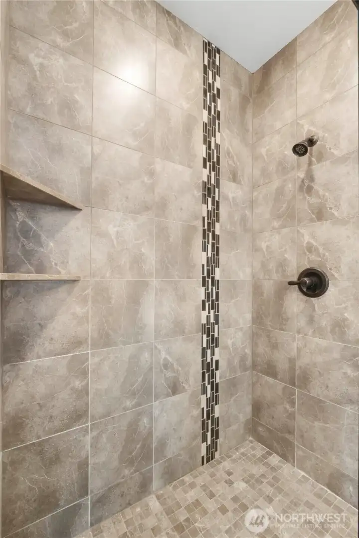 Fully tiled shower in the primary