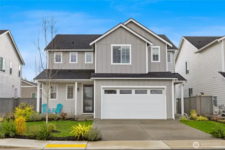 A beautifully landscaped front yard welcomes you home!