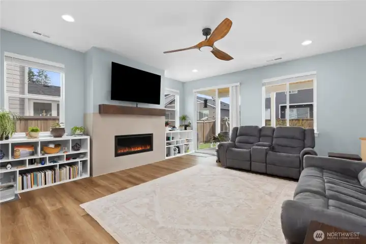 Main floor living room.  Slider leads to covered back patio.