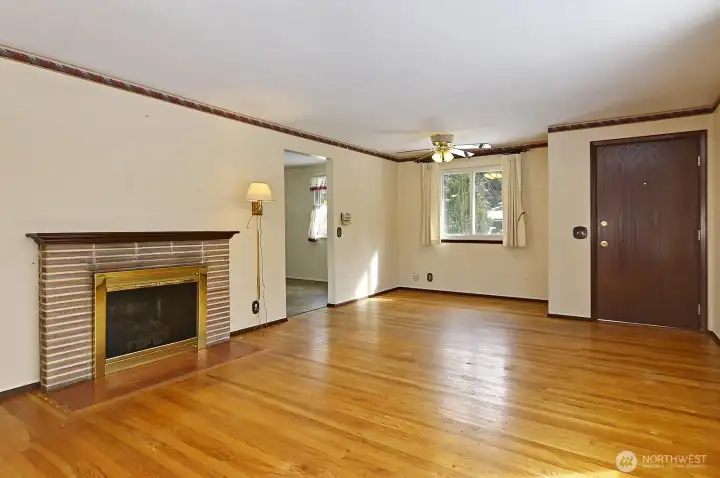 Looking back at the dining room adjacent the kitchen.