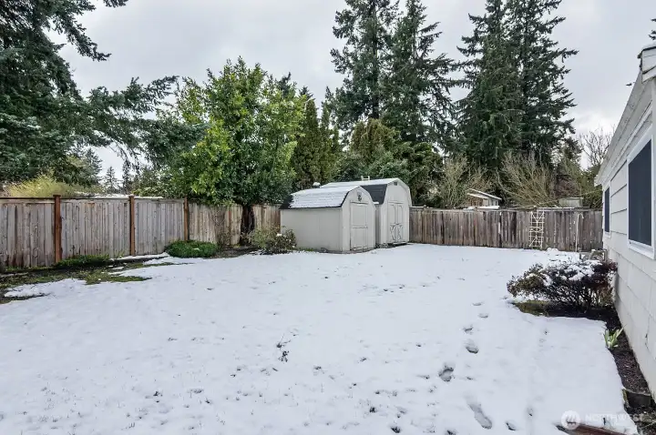 Large level yard. The South end of the property provides space for an RV or Boat.