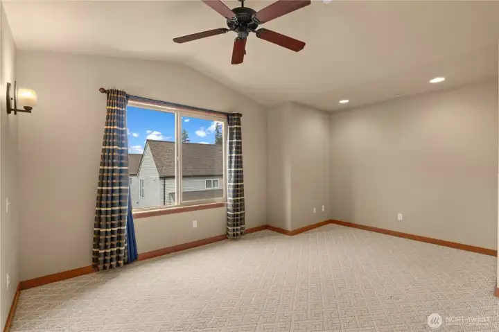 The alcove to the right is perfect to tuck the bed away or to create a sitting area.