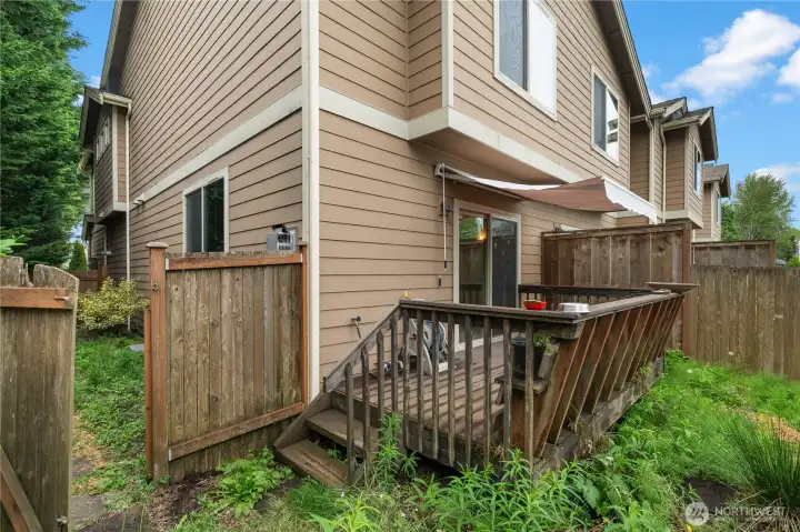 The backyard gate separates the side yard garden space, perfect for giving Fido space to play without tearing up your flowerbeds.