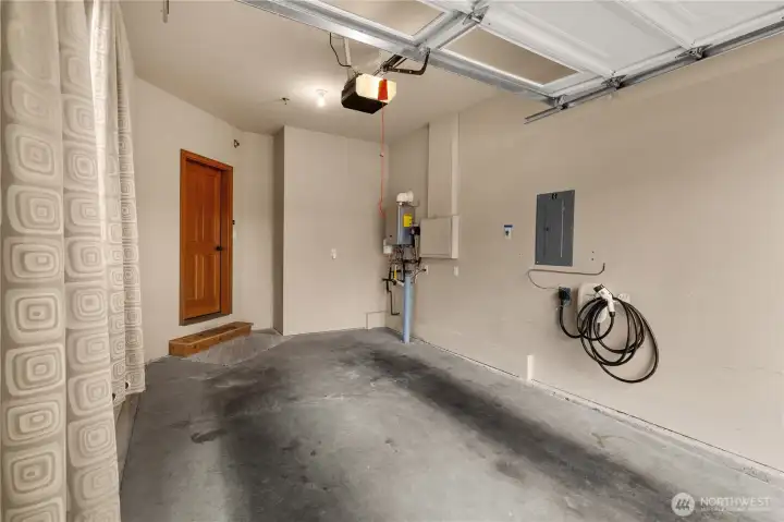 In the one-car garage you’ll find the new Rinnai tankless water heater and Emporia EV Charger (Level 2), compatible with all EV vehicles.
