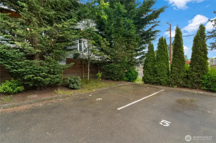 Home includes a garage with a 1 car garage and assigned parking spot number 6. Additional guest parking available in the lot.