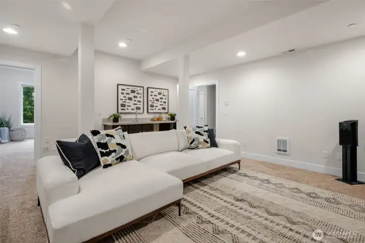 A separate bonus room with wet bar makes the perfect media or game room, plus ample storage throughout