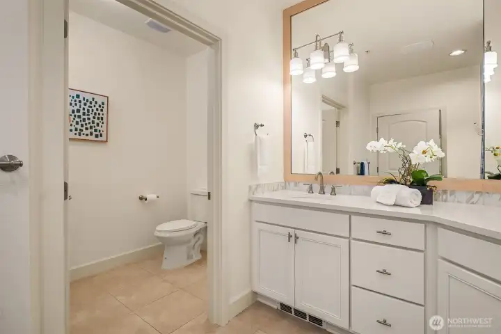 Large toilet room has 35" doorway and large turning radius