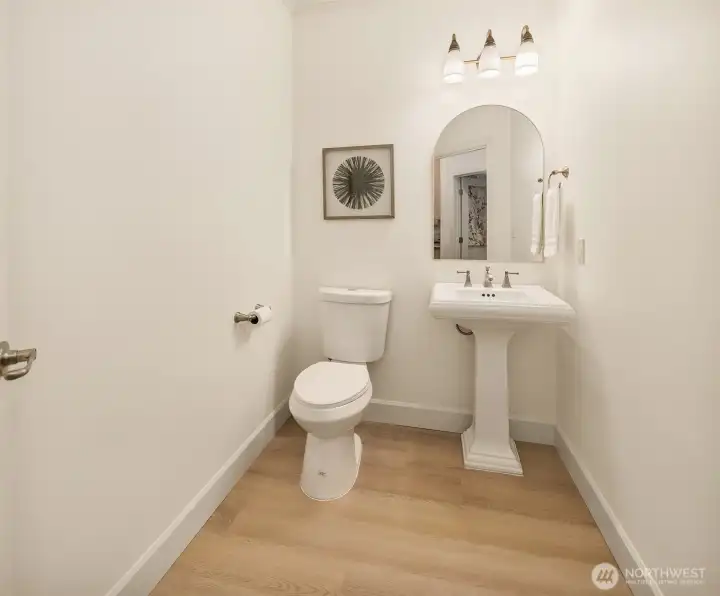 Hall bath has 35" doorway and large turning radius