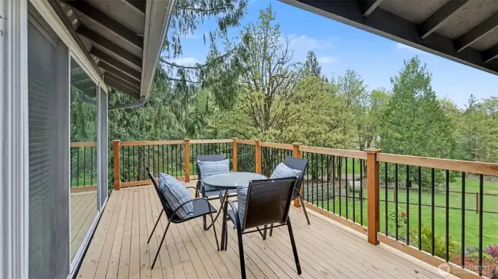 Relax on the front deck—perfect for enjoying a morning coffee or unwinding in the evening.