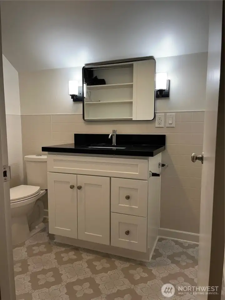 Upper Unit Second Level Bathroom (Taken before the tenants moved in)