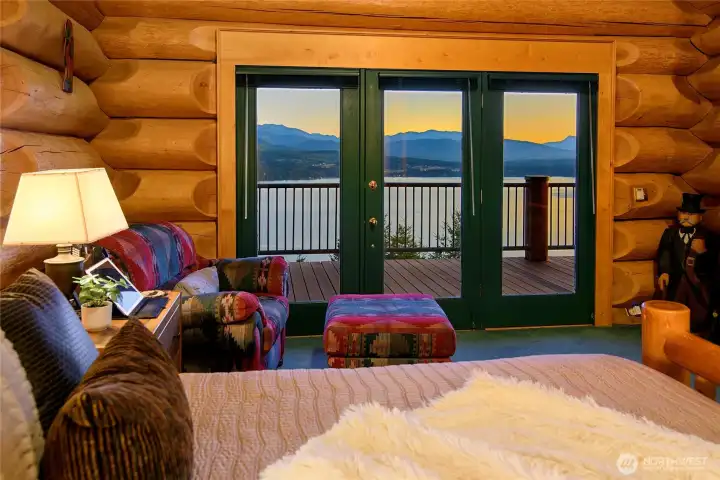 Primary Bedroom with french doors to the deck.