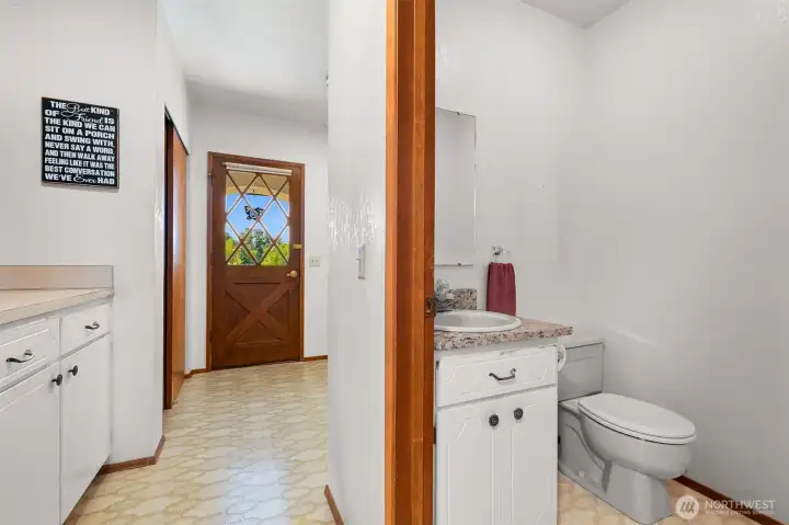 Half bath with large laundry area on main level Half bath with large laundry area on main level