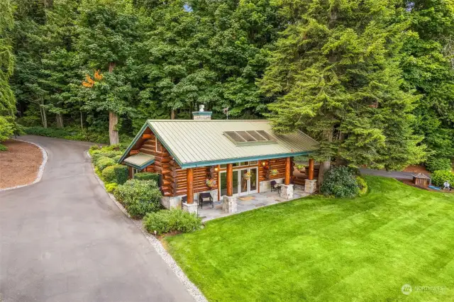 Log cabin in the center of the property