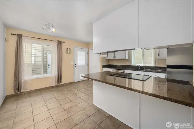 Kitchen and dining are perfectly situated off of eachother.