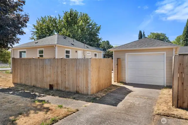 Backyard with detached garage.