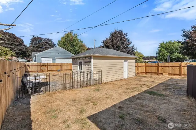Side yard view with parking area.