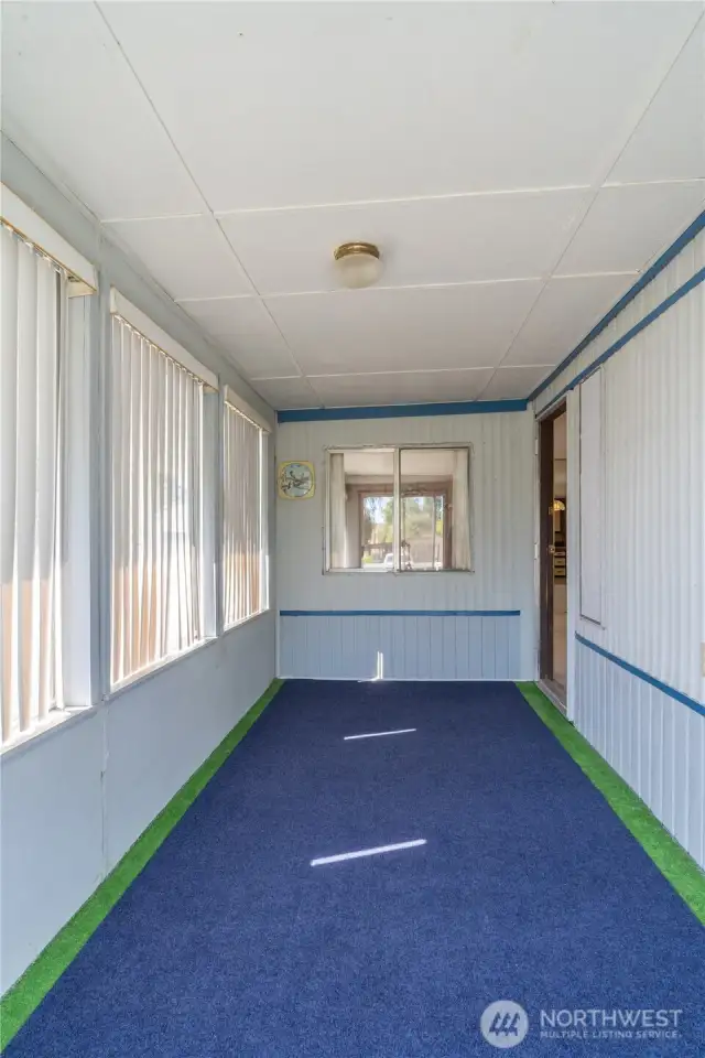 Sun room in front of house