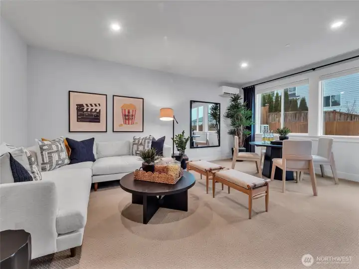 Lower level bonus room overlooks landscaped and fully fenced rear yard.  Photo is of model.  Elements in home can vary.