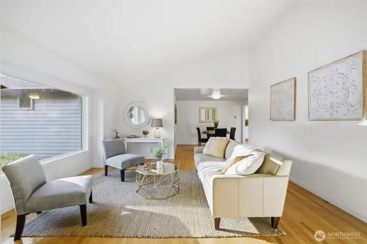 vaulted ceilings and natural light connect the living and dining spaces!