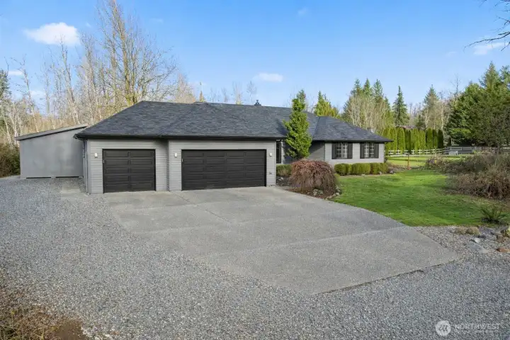 Nice oversized 3 car garage & plenty of parking for RV or boat!