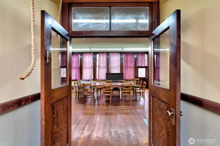 Step inside and step back in time! Ropes exit through ceiling to functional school bell!