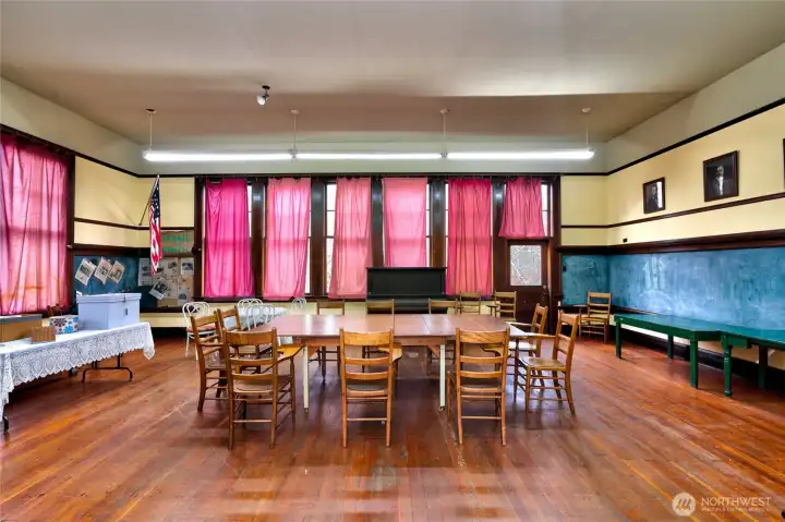 Beautiful main room full of original detail and woodwork.