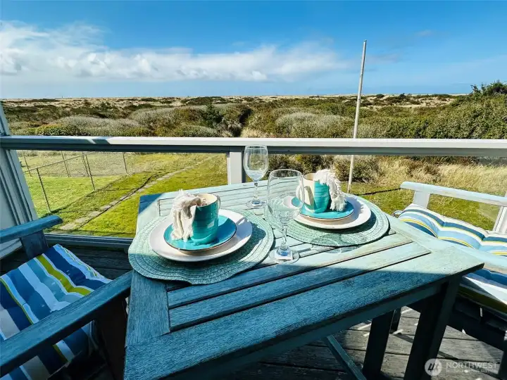 Cozy deck to enjoy your morning coffee and the beautiful sunsets!