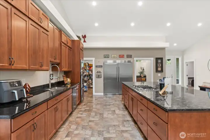 Pantry is a few steps from the garage door entry for unloading ease from vehicles to pantry.