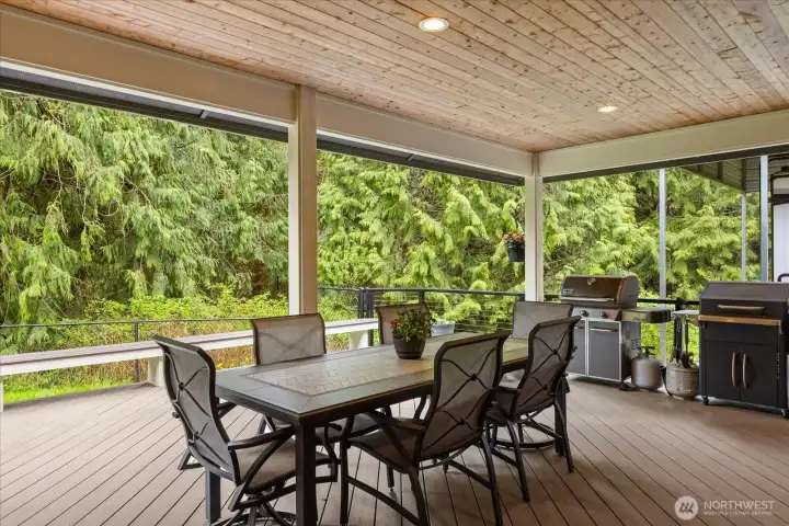 Covered porch directly off of the kitchen/dining area.