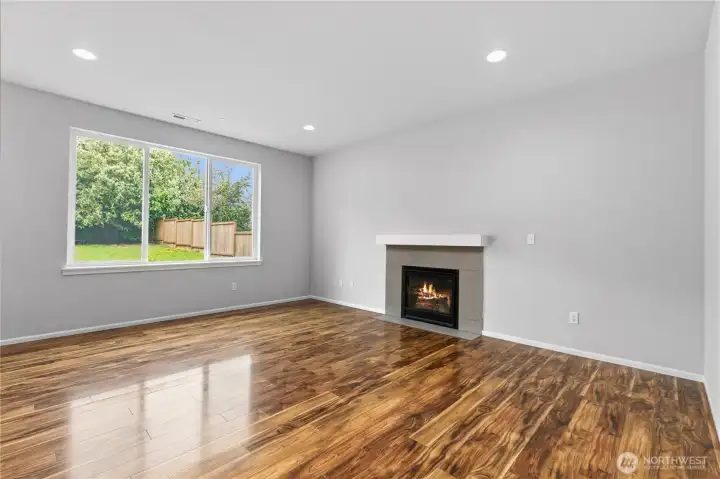 Living room with gas fire place.