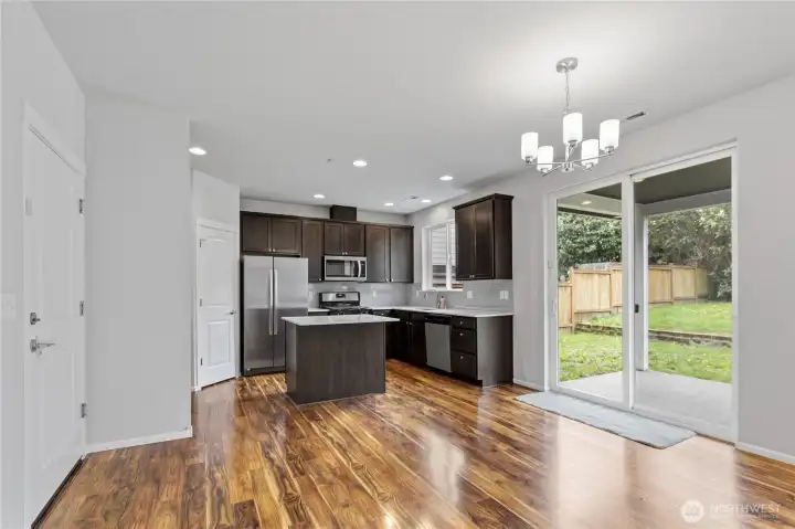 Kitchen with eating area and dining area.