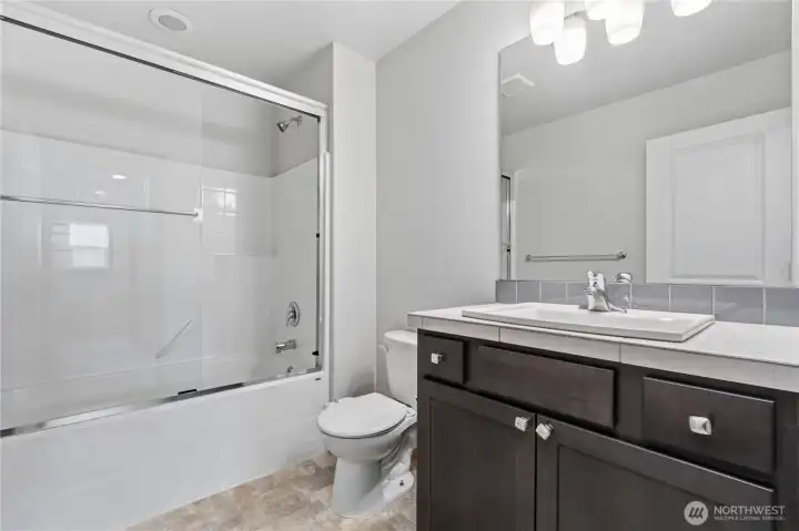 Second full bathroom on level 2.