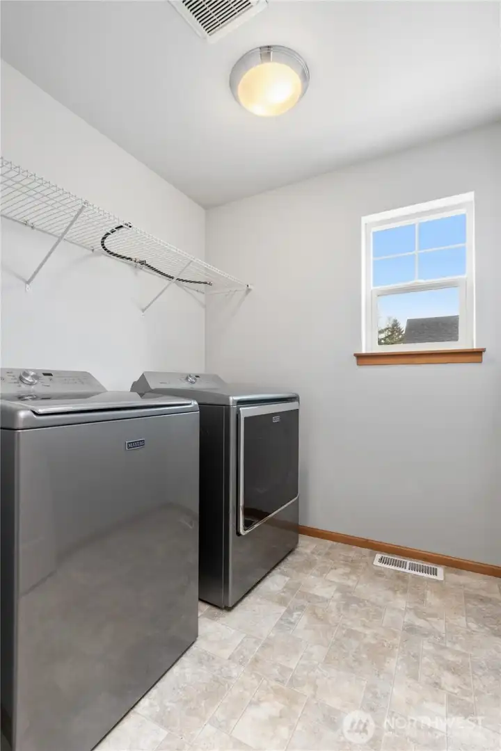 Dedicated laundry room on level 2.