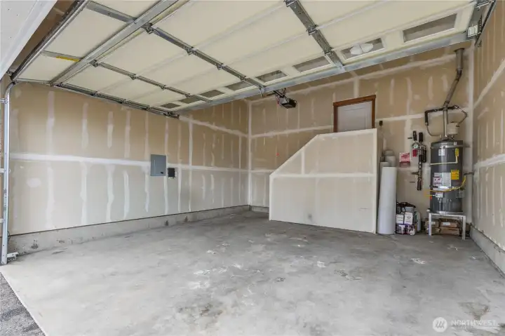 2-car garage with high ceiling, great for storing bikes etc.