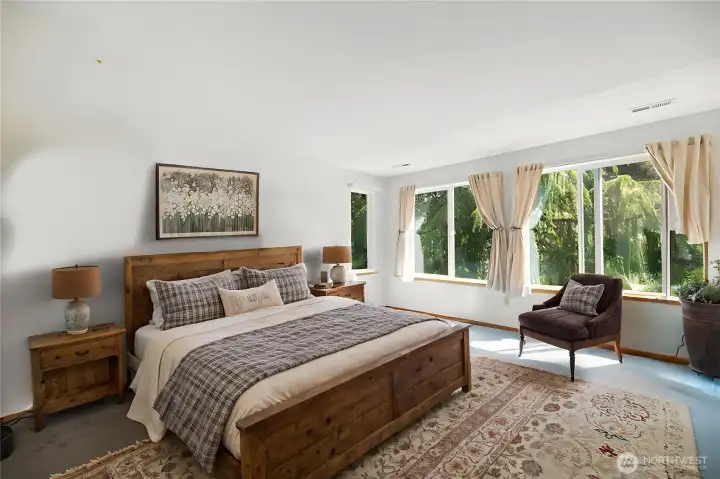 Wake up to sunlight and your own private forested acreage property.