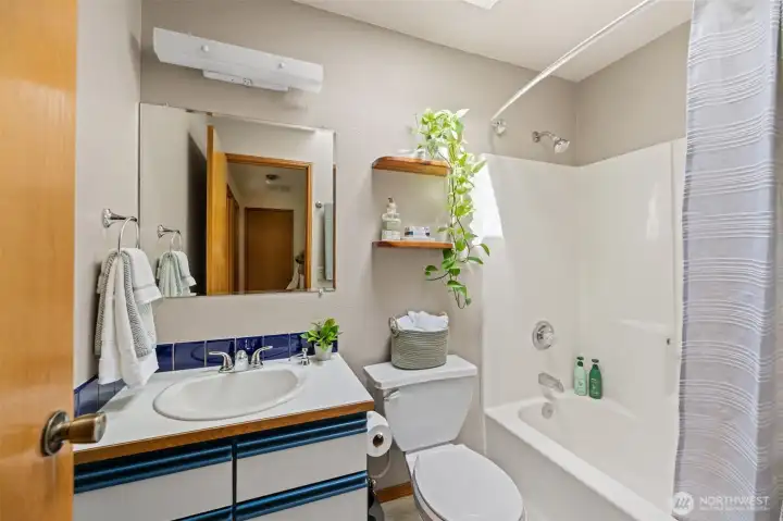 Upstairs secondary bath is well placed in the hallway for bedroom 2 & 3.