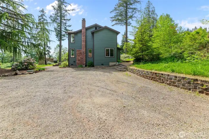 The main acreage space is cleared allowing all day natural light to flood the property. Enjoy privacy without compromising on sunlight.