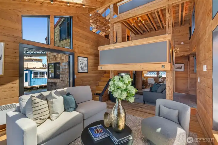 Dramatic vaulted ceilings and skylights bathe this home in natural light.