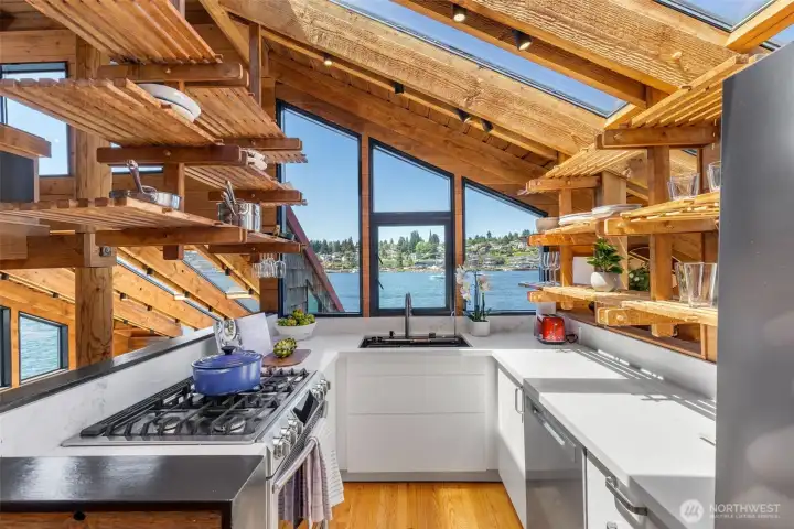 Chef’s kitchen with quartz countertops, Lefton workstation sink, and all-new appliances.