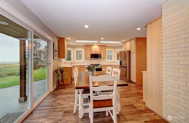 Kitchen/Eating Area, dont miss the 1/2 bath from entry in kitchen, and built in cabinets