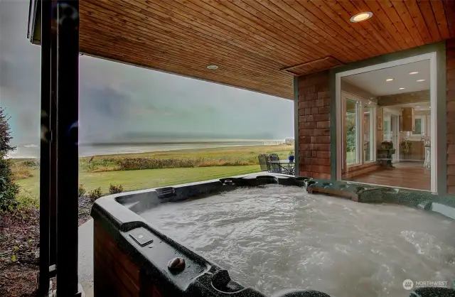 Covered hot tub off Primary Bedroom