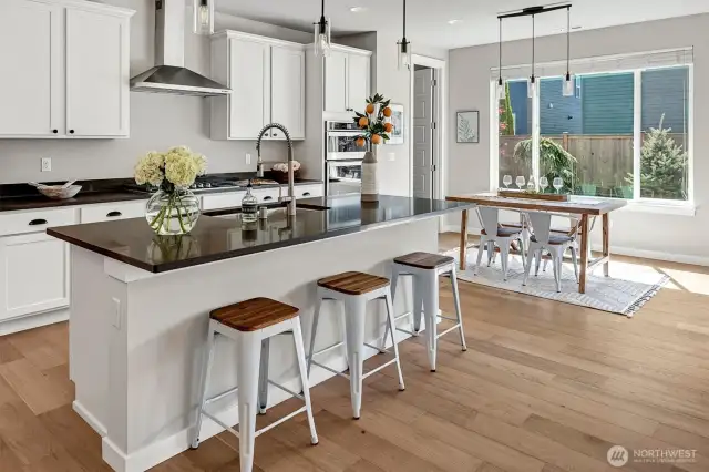 Spacious kitchen with dining at island or table