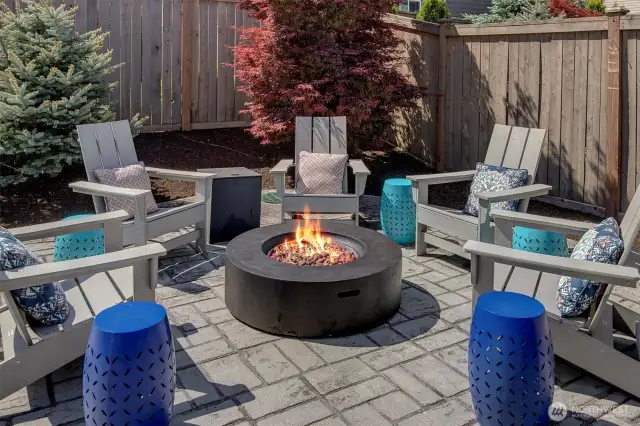 Paved pathway to fire pit area and spa