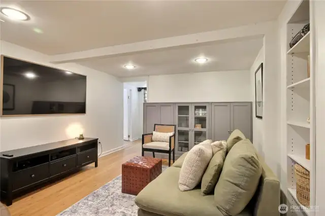Huge lower level family room with high ceilings and   separate entrence.