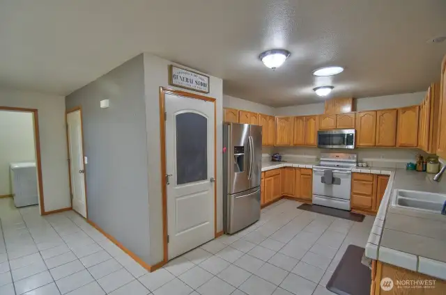 Several views of the kitchen and pantry.