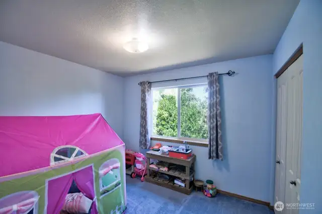 Extra finished room has a closet and could be used as a bedroom.