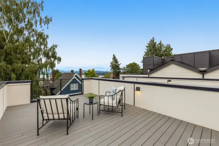 Enjoy coffee, cocktails, or container gardening on this serene outdoor escape.