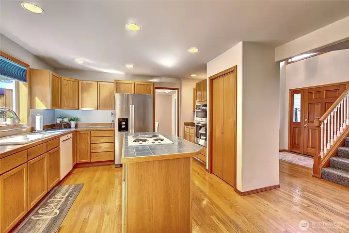 You'll love this eat-in-kitchen with new stove/microwave and newer refrigerator!